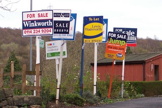 House For Sale Signs on River Bank, viewed from Low Road, Oughtibridge. Credit - Terry Robinson/Geograph.org.uk